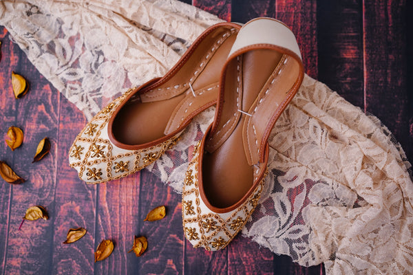 Ivory bridal flats featuring gold dabka/ French wire, gold beads and gold sequins embellishment