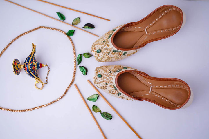 Ivory khussa shoes for women with gold and green dabke, green and gold beads embellishment