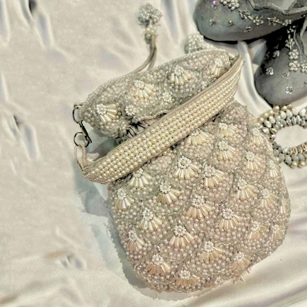 Beaded Beauty: Pearly beads on Grey Cloth Potli Bag, Elegance and Tradition in One