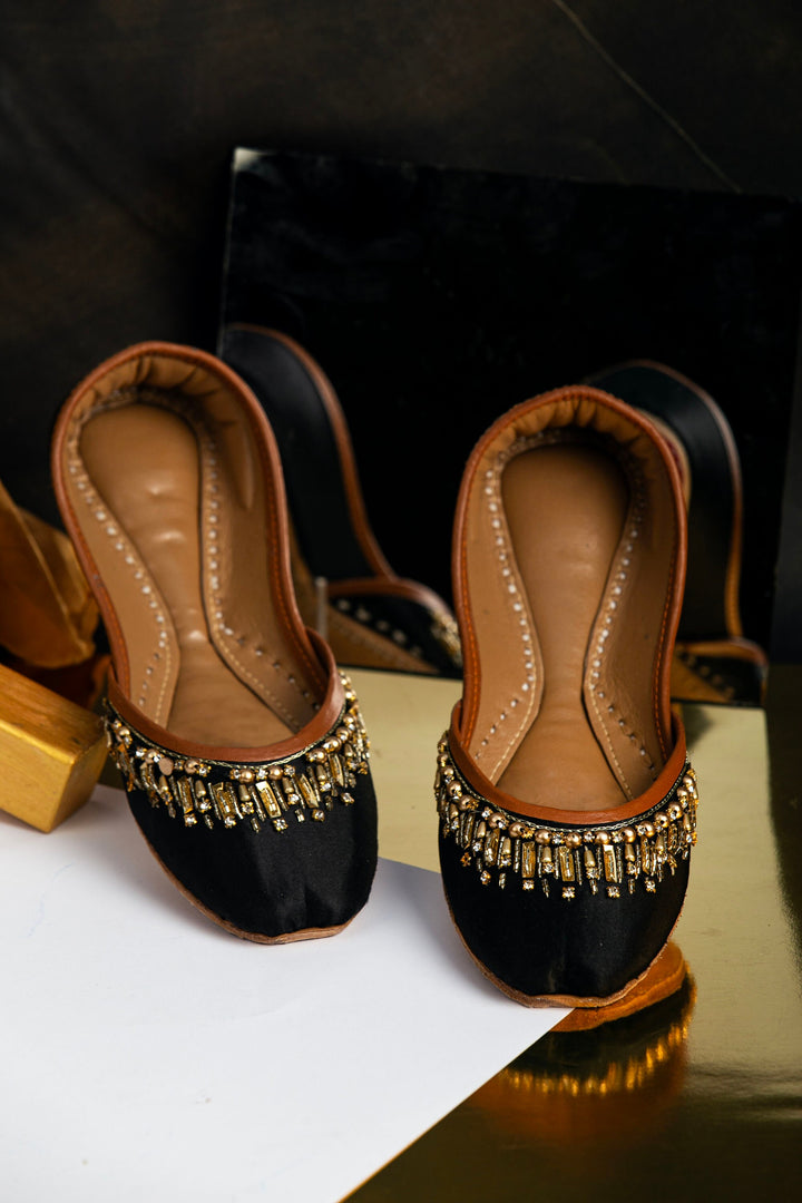 Black bridal flats with gold beads and gold rectangle sequins embellishments.