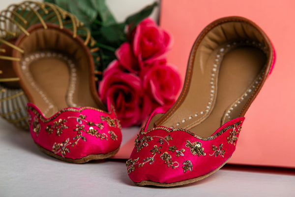 Pink Pakistani Khussa with gold sequins embellishment.