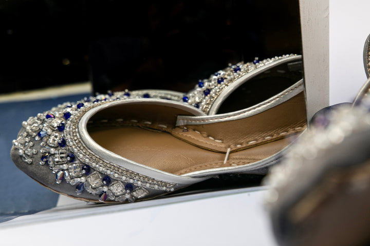 Grey traditional ballet flats with embellishment of blue, clear and white beads and silver sequins.